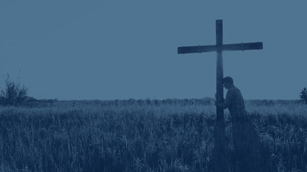 Man Leaning on the Cross