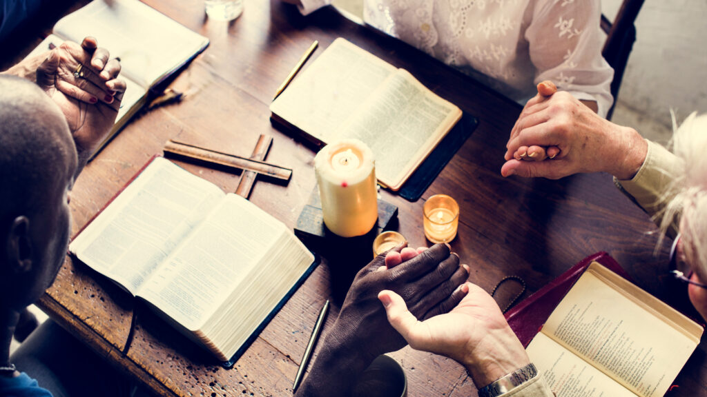 Photo of people praying together